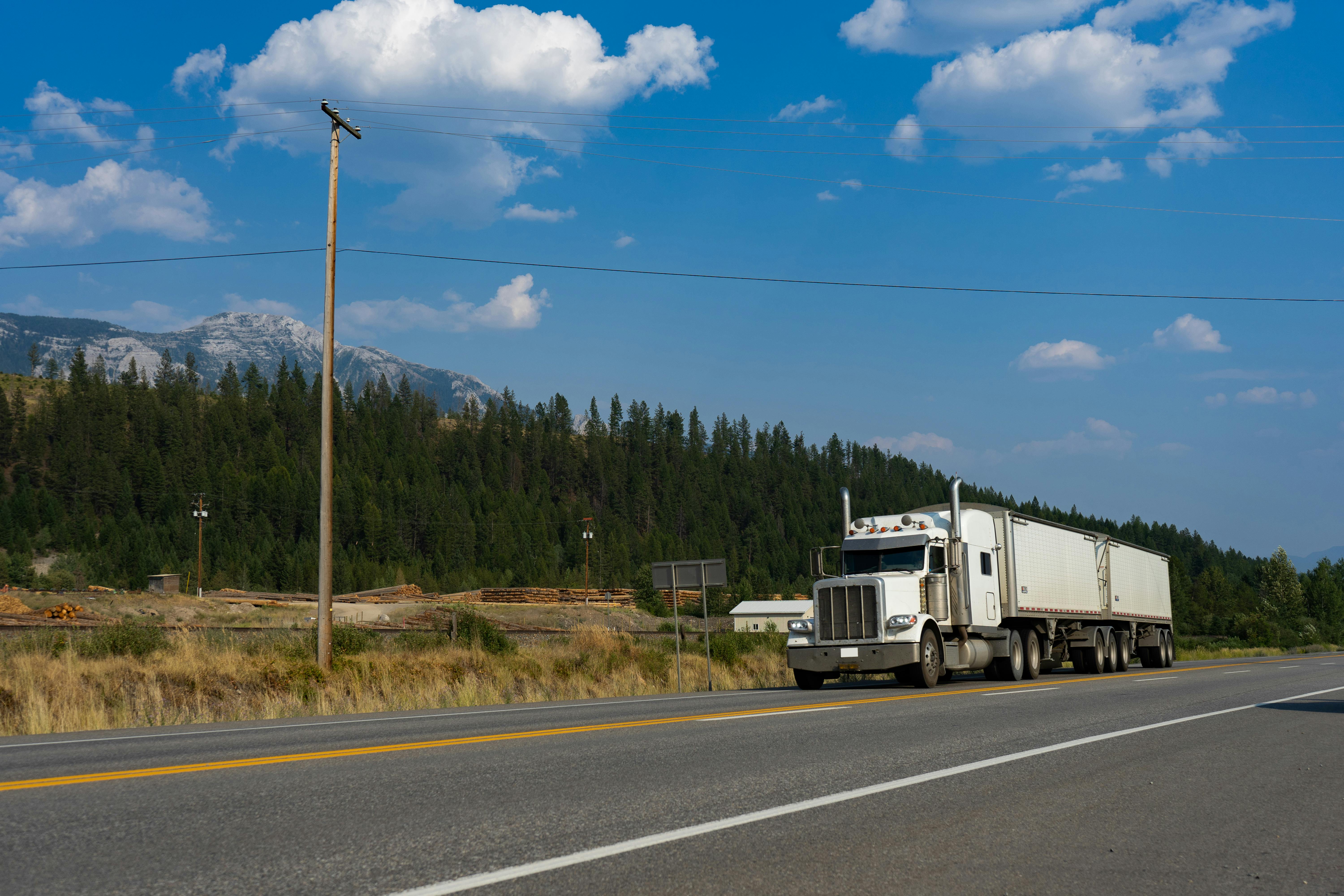 Professional long-distance moving truck on interstate highway